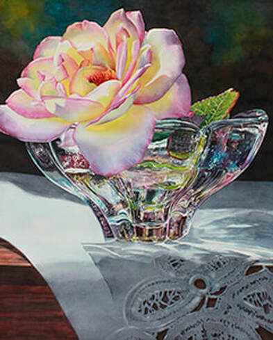 Rose in glass bowl